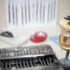 Pinhole Surgical Technique dental kit and training resources displayed together